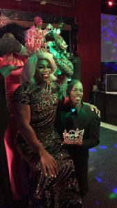 Mykel Knight-Addams Iman St. James (Mr. Cabaret Sweetheart 2018) lends a knee as Giselle Cassidy Carter is crowned Miss Cabaret Sweetheart 2018 at Club Cabaret in Hickory, North Carolina.