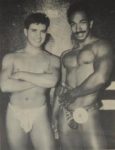 Milo Masters, Mr. Gay All-American 1990 - Mr. Gay Texas All-American 1988 Carlos Miguel (left) congratulates his successor, Mr. Gay Texas All-American 1989 Milo Masters (right.) As Mr. Gay Texas, Masters went on to bring the national title back to Texas as MGAA 1990.