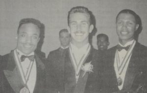 Newly-named Mr. Gay All-American 1992 John Michael Gordon poses with his court, first alternate Kenny Jackson (left) and second alternate Ron Foster (right, competing as Mr. Mid-West but also a former Mr. Gay Arkansas All-American.)