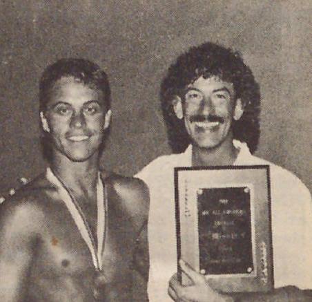 Mr. Gay Indiana All-American promoter Cleo Brasher congratulates his contestant, Mr. Gay Indiana Brad Bemis, on taking the national title as Mr. Gay All-American 1988.