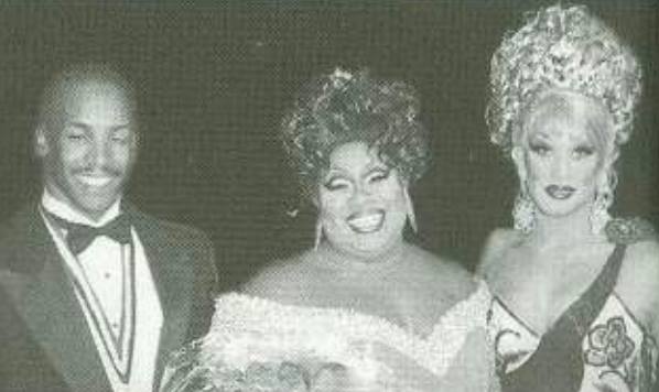 Newly-crowned Miss Gay Texas America 1998 Kofi is congratulated by Mr. Gay All-American 1998 Antonio Edwards and Miss Gay America 1997 Lauren Taylor (MGTX 96.)