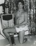 Mr. Gay All-American 1986 Ered Matthew poses for photographers moments after claiming victory at the third annual contest held in Little Rock in 1985.