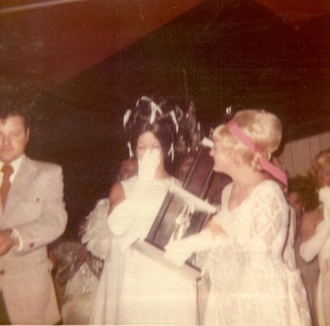June 25, 1972 - Miss Gay Arkansas Norma Kristie reacts to hearing his name called as the winner of the very first Miss Gay America Pageant on what was coincidentally also his 26th birthday. (Pageant founder Jerry Peek is at left.) 