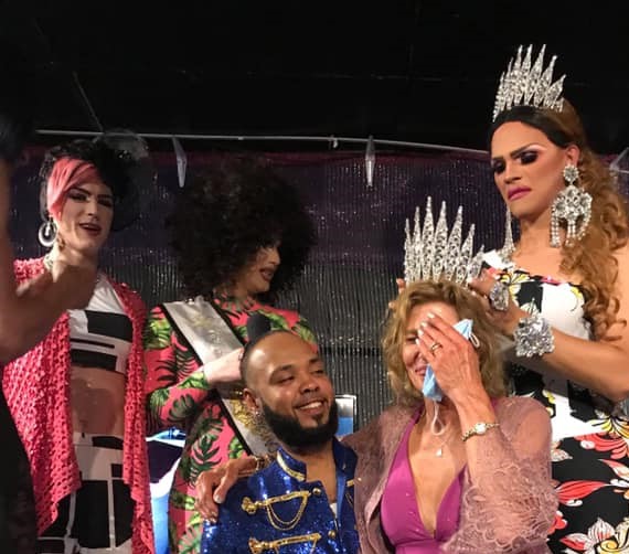 Connie on the knees of Isaac Ismael is crowned Miss Southbend Emeritus by Ava Aurora Foxx. In the back are Electra Lites and Mimi Sharp | Southbend Tavern (Columbus, Ohio) | 6/27/2020 CROPPED