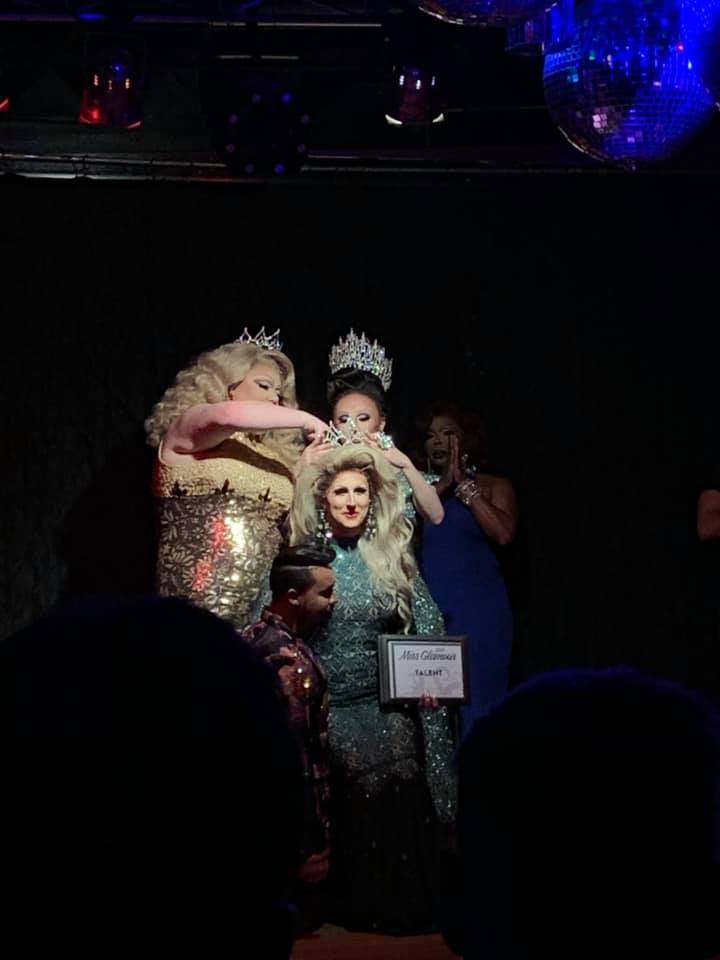 Ana Crusis (seated on Monroe DeMoore's knee) being crowned the next Miss Glamour by Dixxxie Licious and Kassia Brookes. Siniya Omni Hall in the blue dress is back stage. | Miss Glamour | Gregs (Indianapolis, Indiana) | 4/21/2019