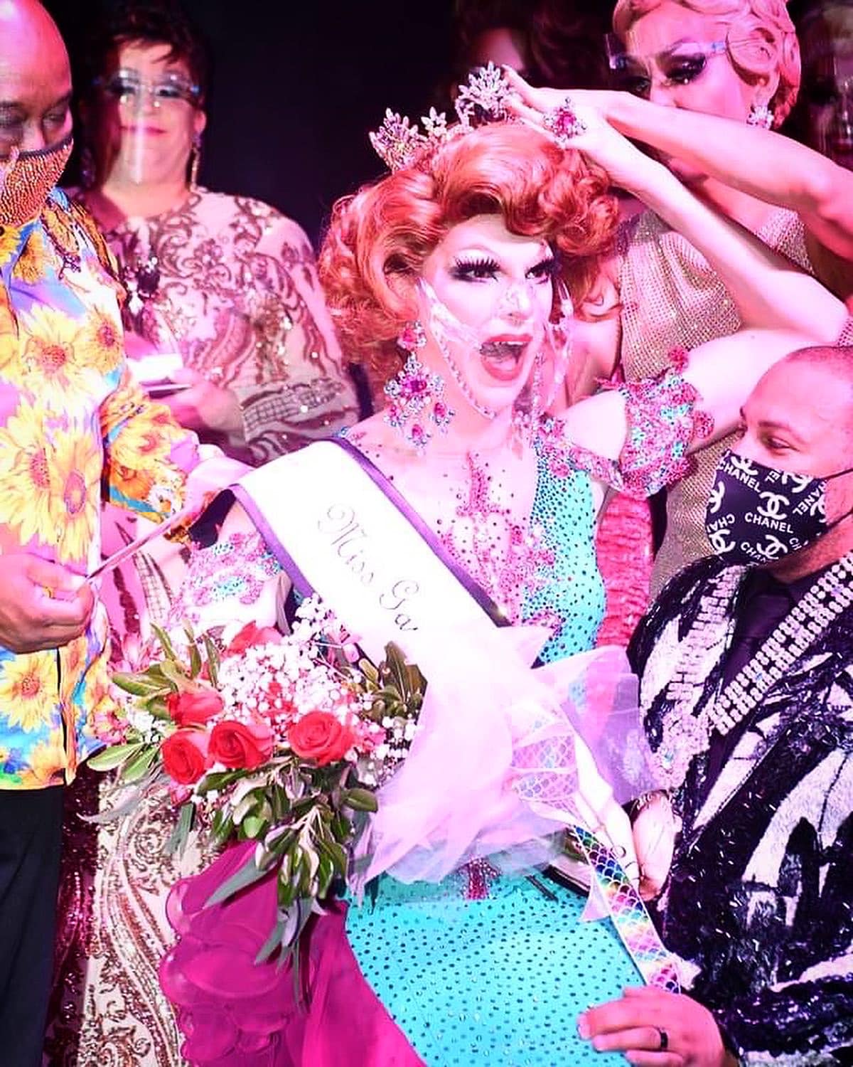 FiFi DuBois seated on the knee of Simba R. Hall is crowned as Miss Gay Sin City America by Pattaya Hart with an assist by Larry Edwards aka Hot Chocolate (far left). | Miss Gay Sin City America | Jimmy's at Madison's (Las Vegas, Nevada) | 4/19/2021