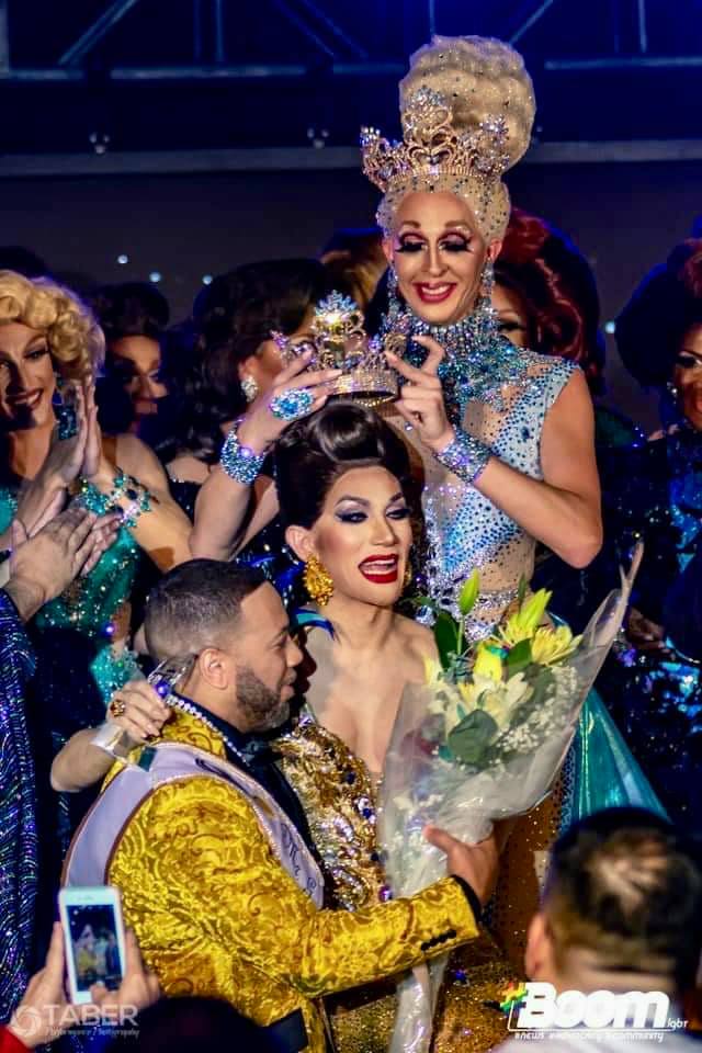 Andora Te'Tee crowns Pattaya Hart as Miss Gay America 2020 who is seated on the knee of Simba R. Hall (Mr. Gay America 2019) | Miss Gay America | Hamburger Mary's (St. Louis, Missouri) and Gateway Classic Cars (O'Falon, Illinois) | 10/2 - 10/5/2019